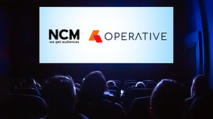 NCM and Operative logos superimposed on a cinema screen in front of an audience.